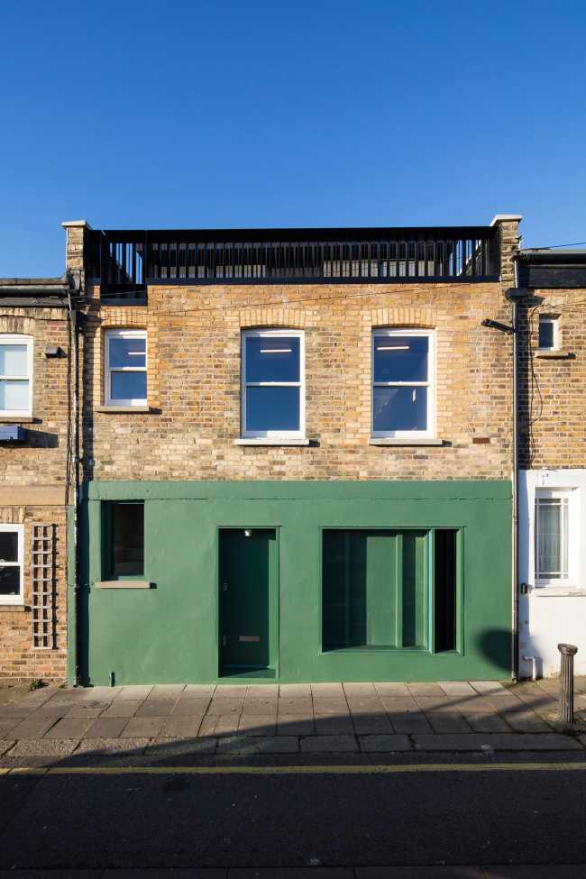 Fachada de espacio de ladrillo y color coabitativo